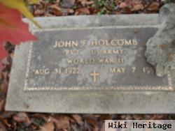 John F. Holcomb