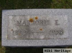 Marjorie E White