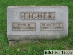 John M Eicher