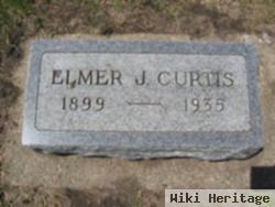 Elmer J Curtis