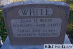 John H White