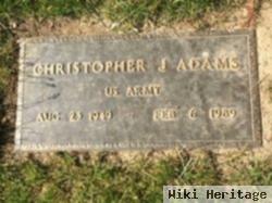 Christopher J Adams