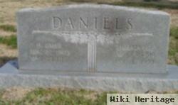 H Omer Daniels