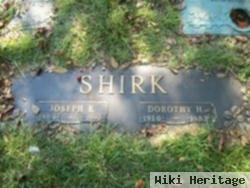 Joseph E Shirk