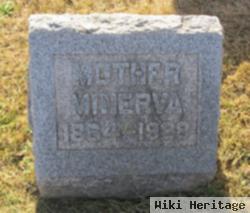 Minerva J John Heacock