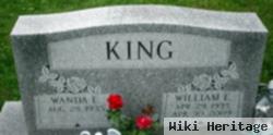 William E King