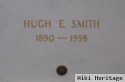 Hugh E Smith