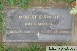 Modest E Wilson Smith