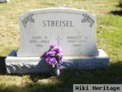 John P. Streisel