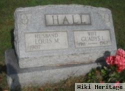 Louis M Hall