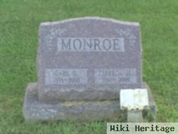 Carl G Monroe