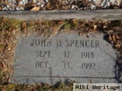 John D Spencer