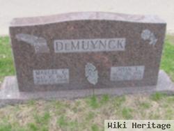 Joan E. Demuynck