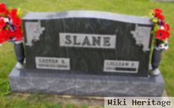 Lester E Slane