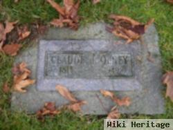 Claude J Olney