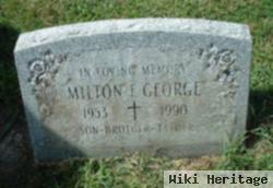 Milton E George