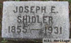 Joseph E Shidler