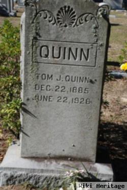 Tom J Quinn