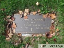 John M Torhan