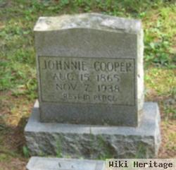 John D Cooper