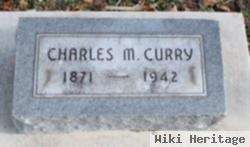 Charles M. Curry