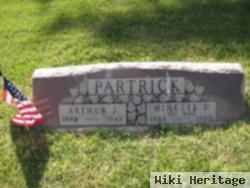 Arthur J Partrick