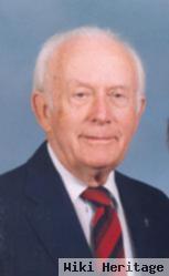 Dr Karl E Carson