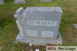 Charles F Desmarais