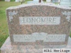 Theresa E. Longmire