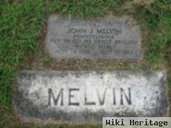 John J Melvin