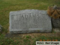 Kenneth J Adams