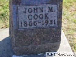 John M Cook
