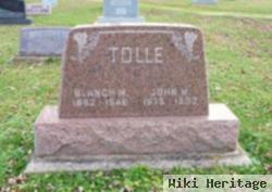 John W Tolle