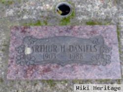 Arthur H Daniels