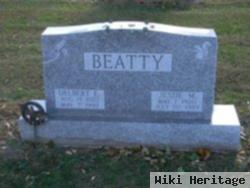 Delbert E Beatty