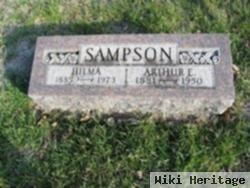 Arthur E Sampson