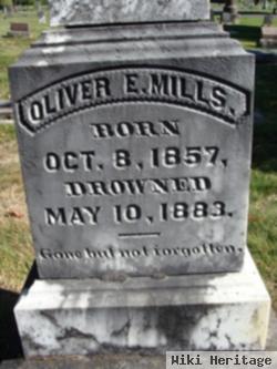 Oliver E Mills