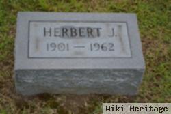 Herbert J White
