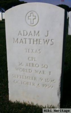 Adam J Matthews