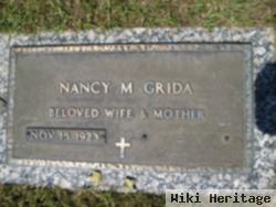 Nancy M Grida