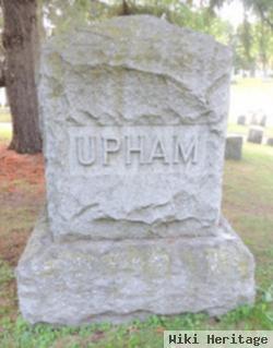 Charles M Upham