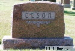 Olof E Olson