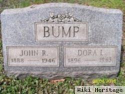 Dora L Bump