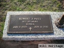 Robert J Putt