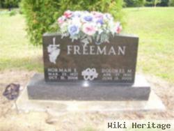 Norman E Freeman