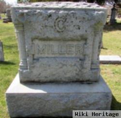 Carl H Miller