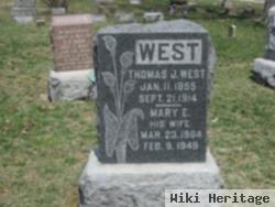 Thomas J West