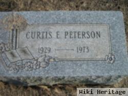 Curtis E Peterson