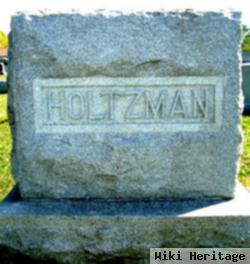 Andrew J Holtzman