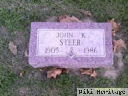 John K Steer